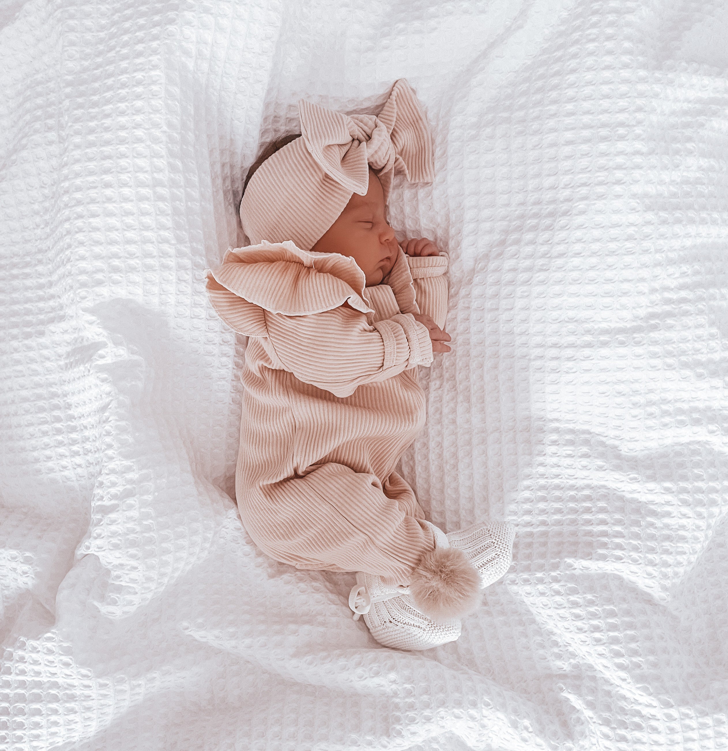Buttermilk Ruffle Onesie