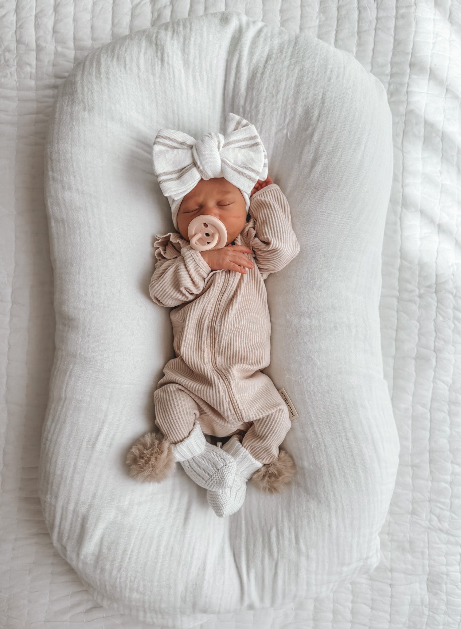 Buttermilk Ruffle Onesie