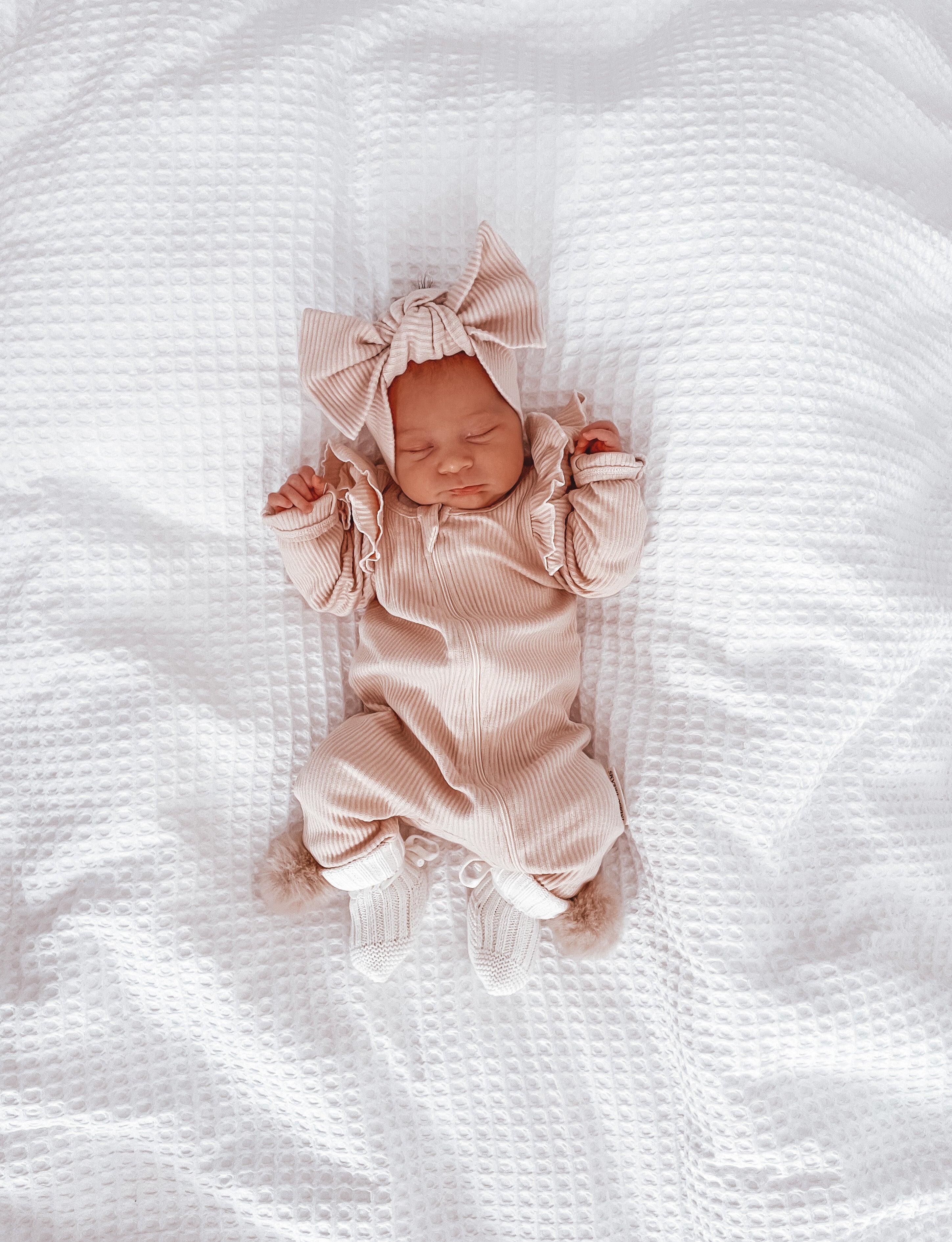 Buttermilk Ruffle Onesie